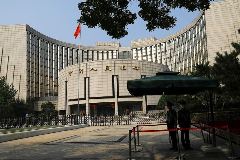 China central bank says will 'resolutely' curb big currency swings