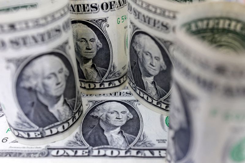 Dollar plunges as U.S. inflation data spurs exodus from crowded trade