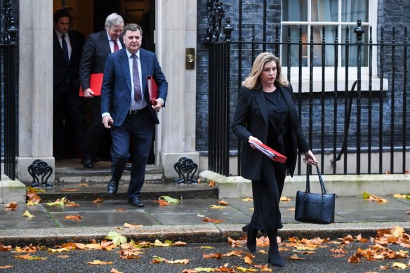 Mel Stride, UK work and pensions secretary (second from right) departs following a cabinet meeting at 10 Downing Street.