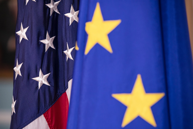 The European Union and United States flags.