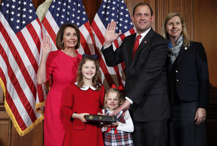 House Speaker Nancy Pelosi of Calif., left, poses during a ceremonial swearing-in with Rep. Andy Barr, R-Ky., second from right, on Capitol Hill, Thursday, Jan. 3, 2019 in Washington during the opening session of the 116th Congress.