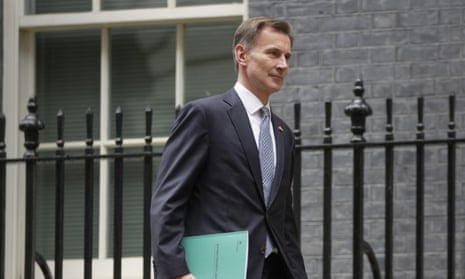 A photo of chancellor Jeremy Hunt leaving 11 Downing Street in November.