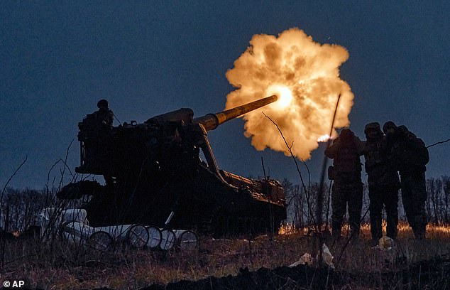Ukrainian soldiers fire a Pion artillery system at Russian positions near Bakhmut, Donetsk region, Ukraine, Thursday, Dec. 15, 2022
