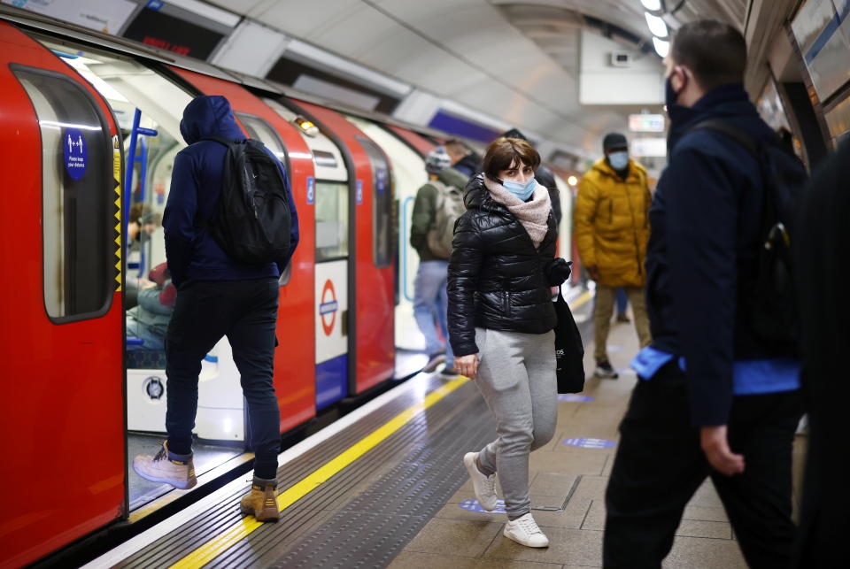 cash  People commute at the Victoria tube station amid the coronavirus disease (COVID-19) outbreak, in London, Britain January 12, 2021. REUTERS/Henry Nicholls