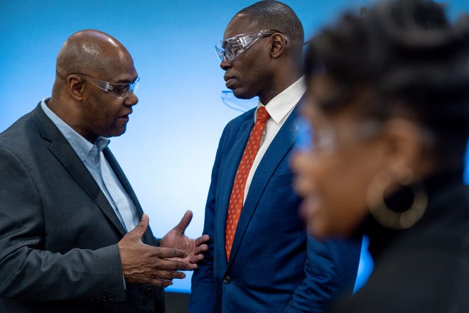 UAW President Ray Curry, left, speaks with Lt. Gov. Garlin Gilchrist at General Motors Flint Engine South in Flint on Friday, Jan. 20, 2023, after the announcement of General Motors investing $918 million in four U.S. plants for expanded V-8 engine production in light-duty full-size pickups and large SUVs as well as component parts for electric vehicles. As part of the investment, two plants in Michigan will receive new products to build: Flint Engine Operations and Bay City Powertrain facilities.
