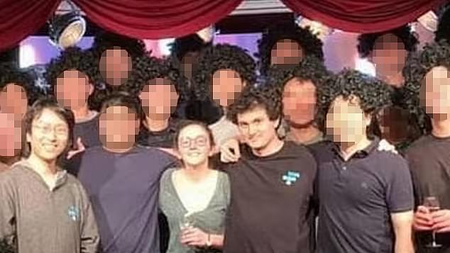 DailyMail.com uncovered a picture from March 2021, which shows SBF, 30, with his arm around ex-girlfriend Caroline Ellison, 28, from his 29th birthday. They're pictured with FTX co-founder Gary Wang (left)
