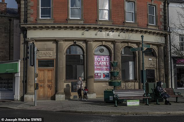 The Belper branch of HSBC is up for let after it closed its doors in 2021 - one of 5,000 banks to close since 2019