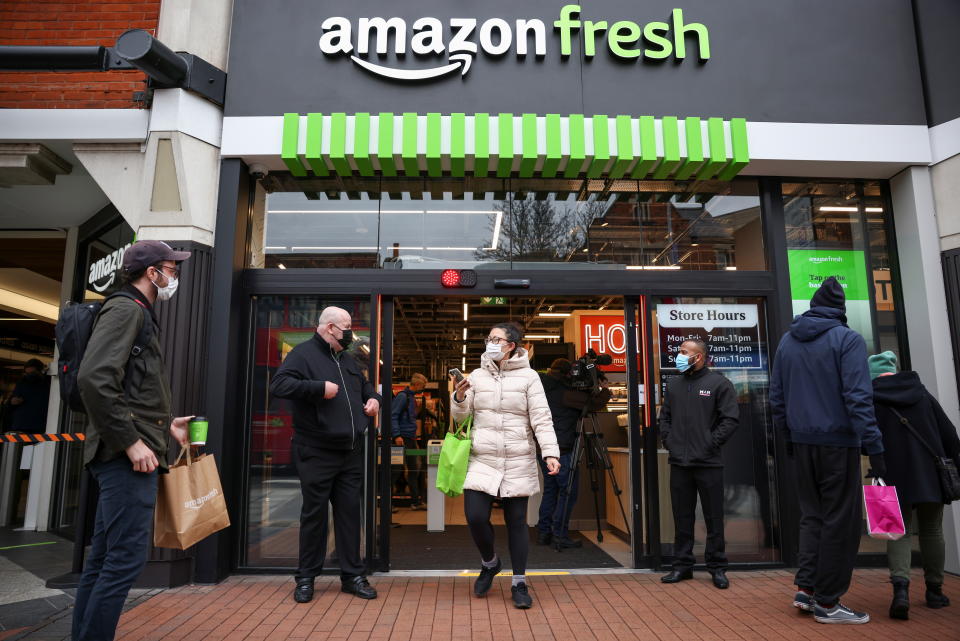 A shopper leaves the UK&#39;s first Amazon Fresh supermarket in London, Britain, March 4, 2021. REUTERS/Henry Nicholls