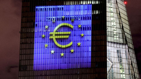 A symphony of light consisting of bars, lines and circles in blue and yellow, the colours of the European Union, illuminates the south facade of the European Central Bank (ECB) headquarters in Frankfurt, Germany, December 30, 2021. REUTERS/Wolfgang Rattay/File Photo
