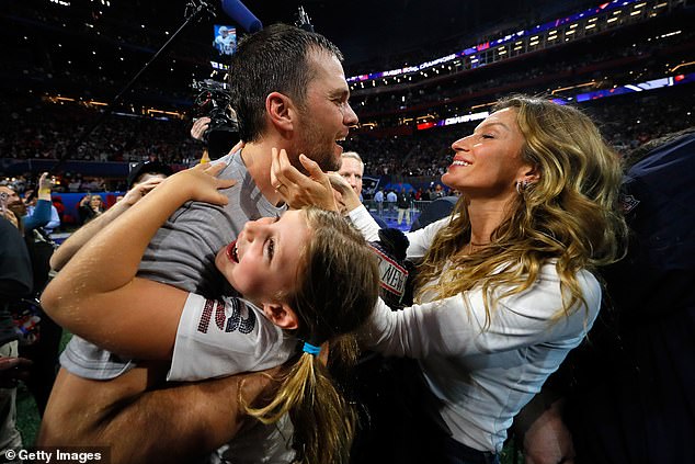 Brady, then with the Patriots, celebrates winning Super Bowl LIII vs. the Rams with Bündchen