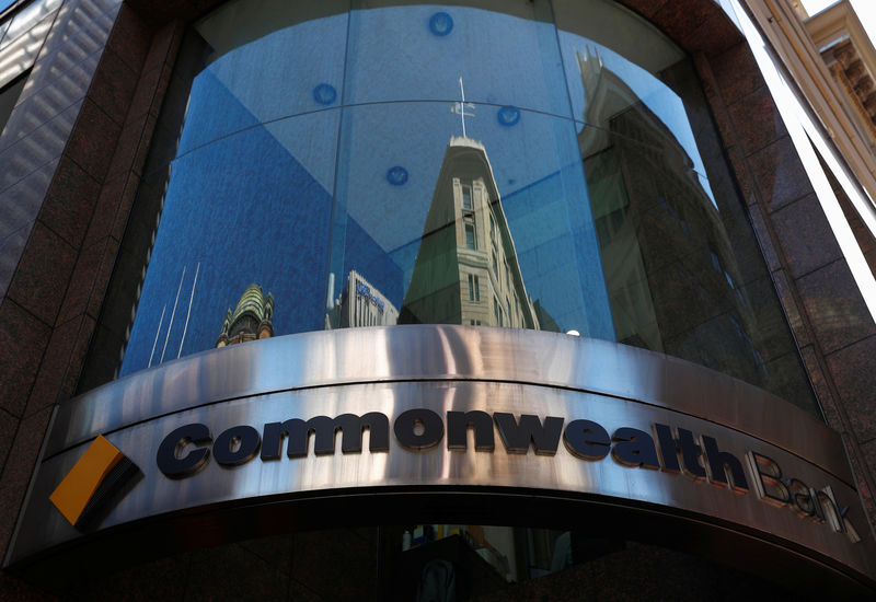 Australia’s big four banks tumble as CBA warns of credit slowdown