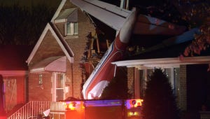 About 43,000 people work as commercial pilots, earning an average of $115,080 a year, according to federal statistics. This photo shows a small cargo plane that crashed into a Chicago home in 2014.