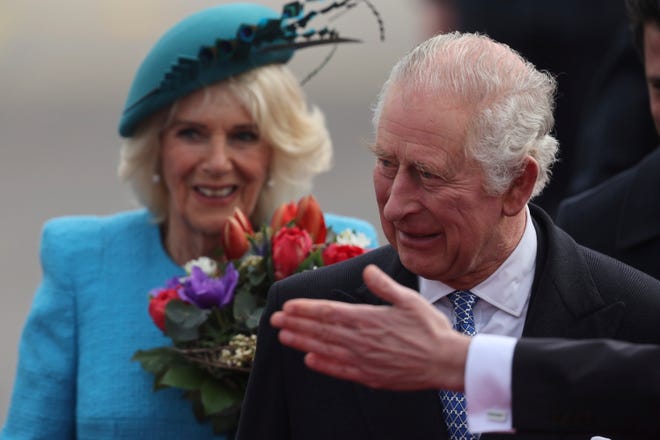 Queen Consort Camilla received a bouquet upon arrival.