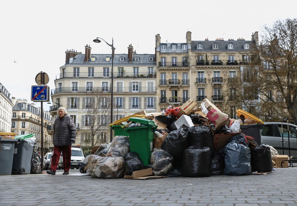 Uncollected garbage is piled up on a street in Paris, March 20, 2023, as sanitation workers continue to strike. (AP Photo/Aurelien Morissard, File)