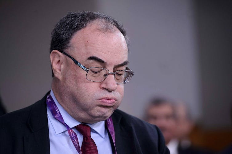 Bank of England Governor Andrew Bailey looking exhausted