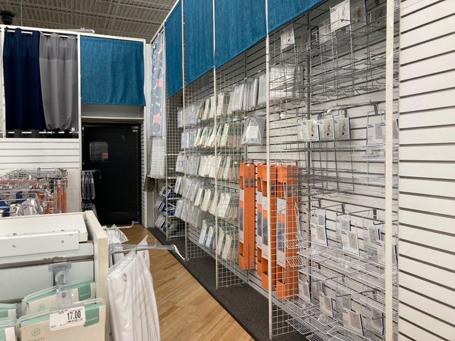 Nearly empty shelves are seen at a Bed Bath & Beyond store, April 10, 2023 in Naples, Fla.