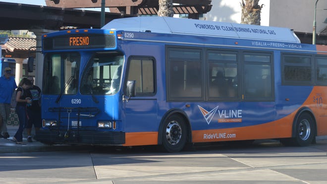 Users get on the V-Line, the daily Visalia-Fresno shuttle. Visalia transit receives federal funding for the bus service.