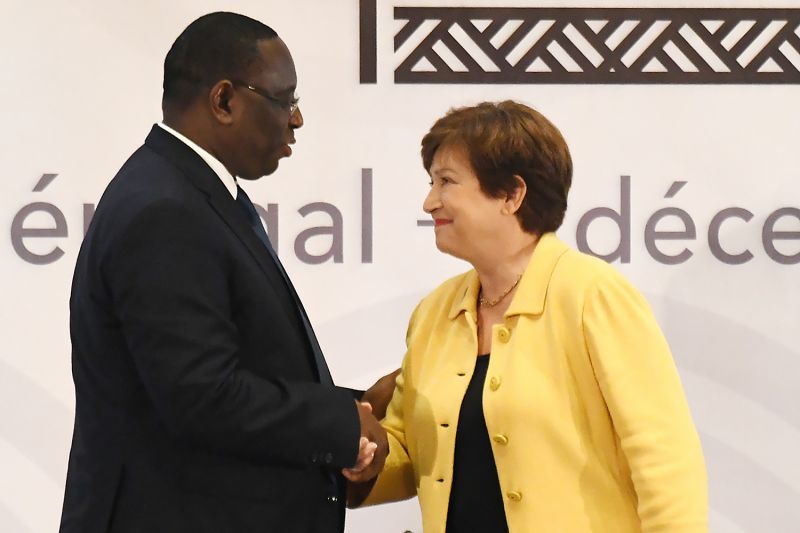 Senegalese President Macky Sall shakes hands with Kristalina Georgieva, the managing director of the International Monetary Fund, at a conference in Diamniadio, Senegal, on Dec. 2, 2019.