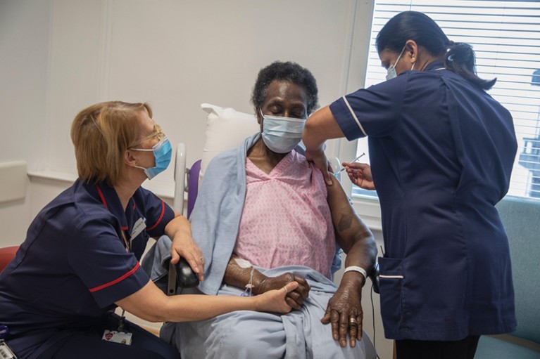 The first patient receiving the Pfizer-BioNTech Covid-19 vaccine, Josephine Faleye, 80, in London.