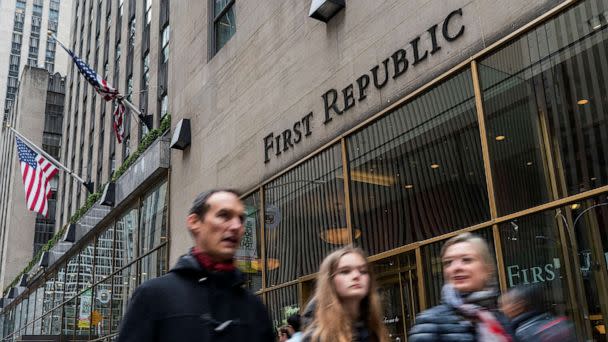 PHOTO: People walk near one of the First Republic Bank branches in New York, April 28, 2023. (Eduardo Munoz/Reuters)