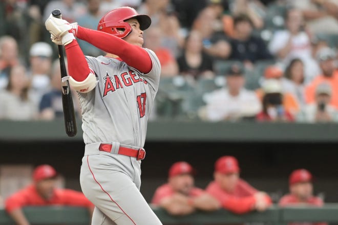 Shohei Ohtani hits a three-run home run against the Baltimore Orioles in the third inning at Oriole Park at Camden Yards.