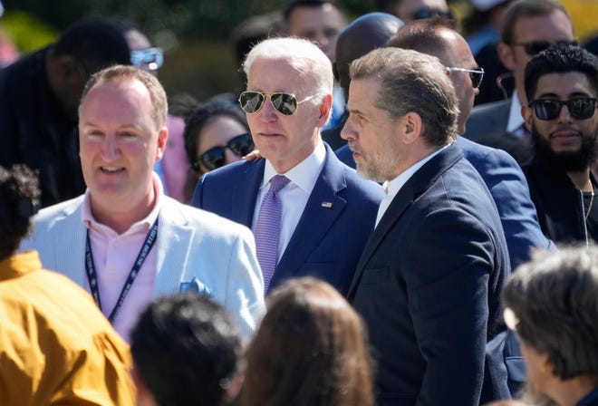 Hunter Biden, right, meets and speaks with his father President Joe Biden, and proceeds to walk back inside of the White House after the President and First lady Jill Biden welcomed and greeted people at the annual Easter Egg Roll on Monday, April 10, 2023.