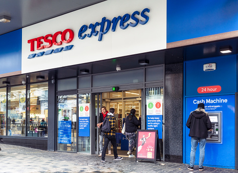 People shopping at a Tesco