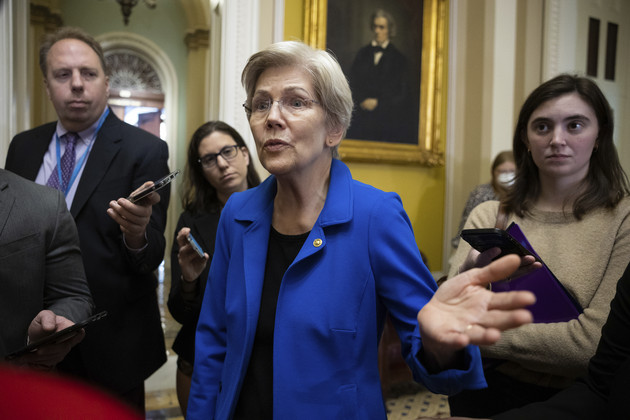 Sen. Elizabeth Warren (D-Mass.) speaks with reporters outside a Senate Democratic Caucus policy luncheon at the U.S. Capitol April 26, 2023. 