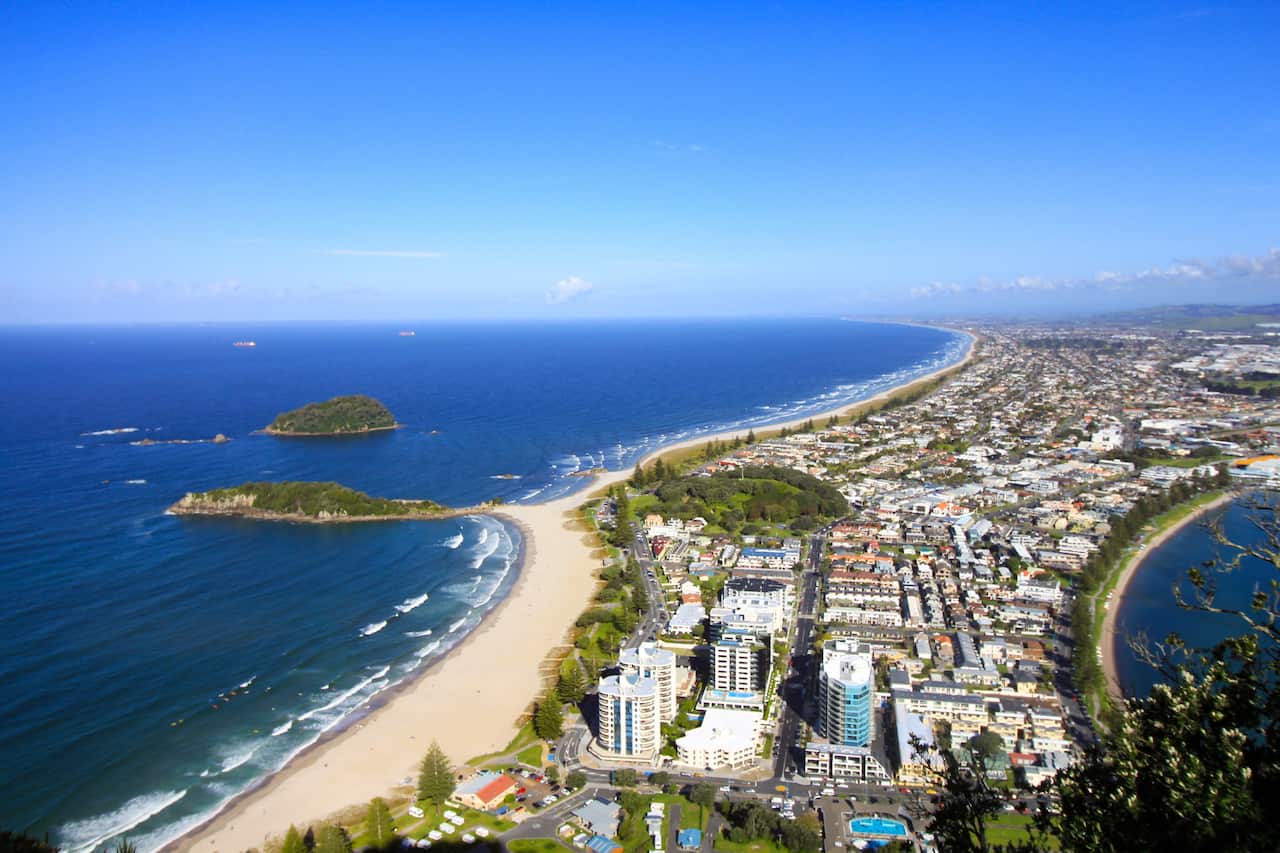 An aerial view of a city and beaches.