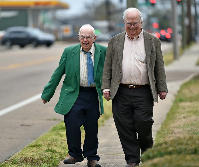 Donald Triplett, left, walks with his now-late brother Oliver Triplett in 2016 in Forest, Mississippi. Donald, who died Thursday, is the first person ever diagnosed with autism.