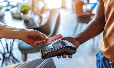 Close-up of a contactless payment at a cafe