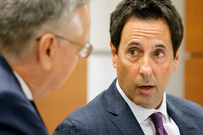Defense attorney Mark Eiglarsh speaks with former Marjory Stoneman Douglas High School School Resource Officer Scot Peterson, left, during jury selection in the case of at the Broward County Courthouse in Fort Lauderdale on Monday, June 5, 2023.