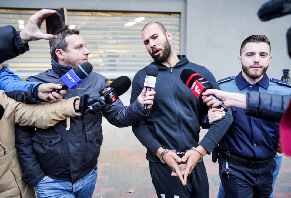 Andrew Tate talks to media as he leaves Romania&#39;s anti-organized crime and terrorism directorate in Bucharest, Romania, on 25 January 2023