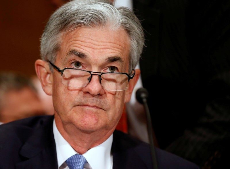 Oil down as China rate cut disappoints; Powell awaited