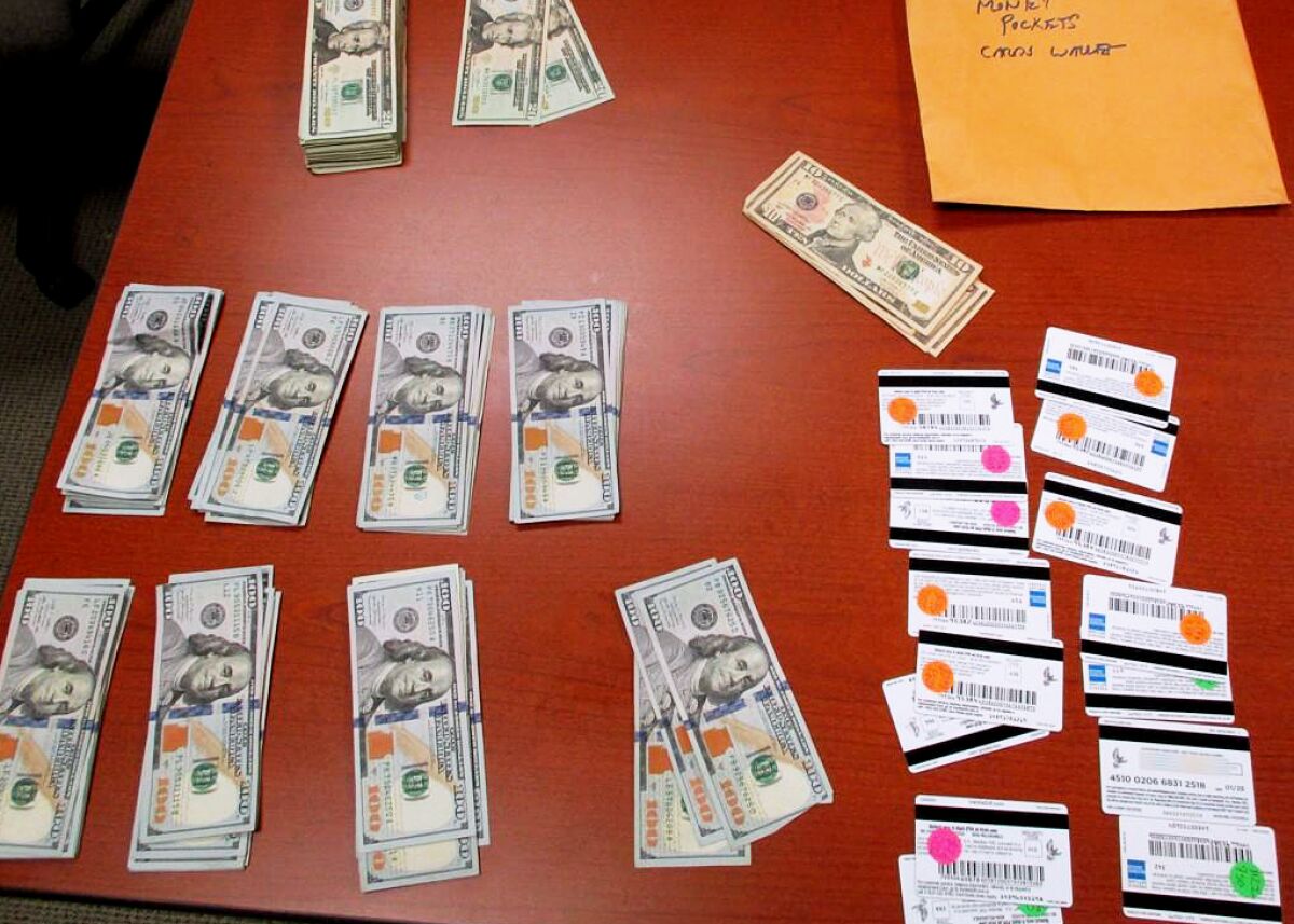 Cash and cloned card seized 