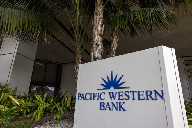 A Pacific Western Bank sign is seen on May 4, 2023 in Los Angeles, California. Pacific Western Bank's stock plunged Thursday in the wake of other bank failures. (Photo by David McNew/Getty Images)