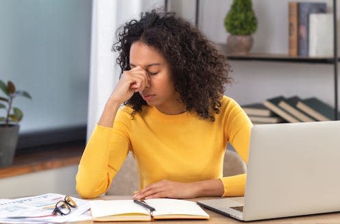 <span class="caption">Many mortgage borrowers are expecting their repayments to rise rapidly.</span> <span class="attribution"><a class="link " href="https://www.shutterstock.com/image-photo/tired-stressed-young-woman-entrepreneur-office-2234106907" rel="nofollow noopener" target="_blank" data-ylk="slk:KucherAV/Shutterstock;elm:context_link;itc:0">KucherAV/Shutterstock</a></span>