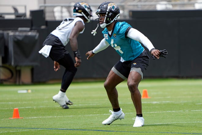 Jacksonville Jaguars running back Tank Bigsby (4) takes part in a drill during an NFL football rookie camp, Friday, May 12, 2023, in Jacksonville, Fla. (AP Photo/John Raoux)