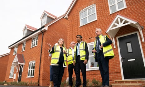 Rishi Sunak and Michael Gove meeting Jennie Daly, the CEO of Taylor Wimpey, during a visit to the Heather Gardens housing development in Norwich.