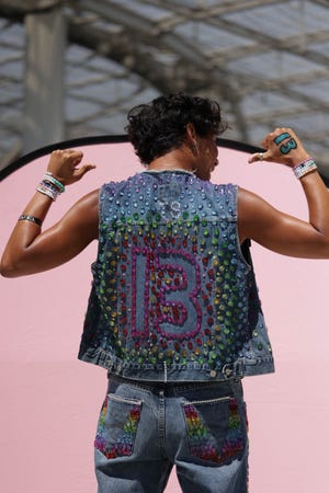 Donnie Collins, 20, poses outside of SoFi Stadium on Aug. 3. Taylor Swift ends the first U.S. leg of the Eras Tour with a six-night stint at SoFi Stadium in Inglewood, Calif.