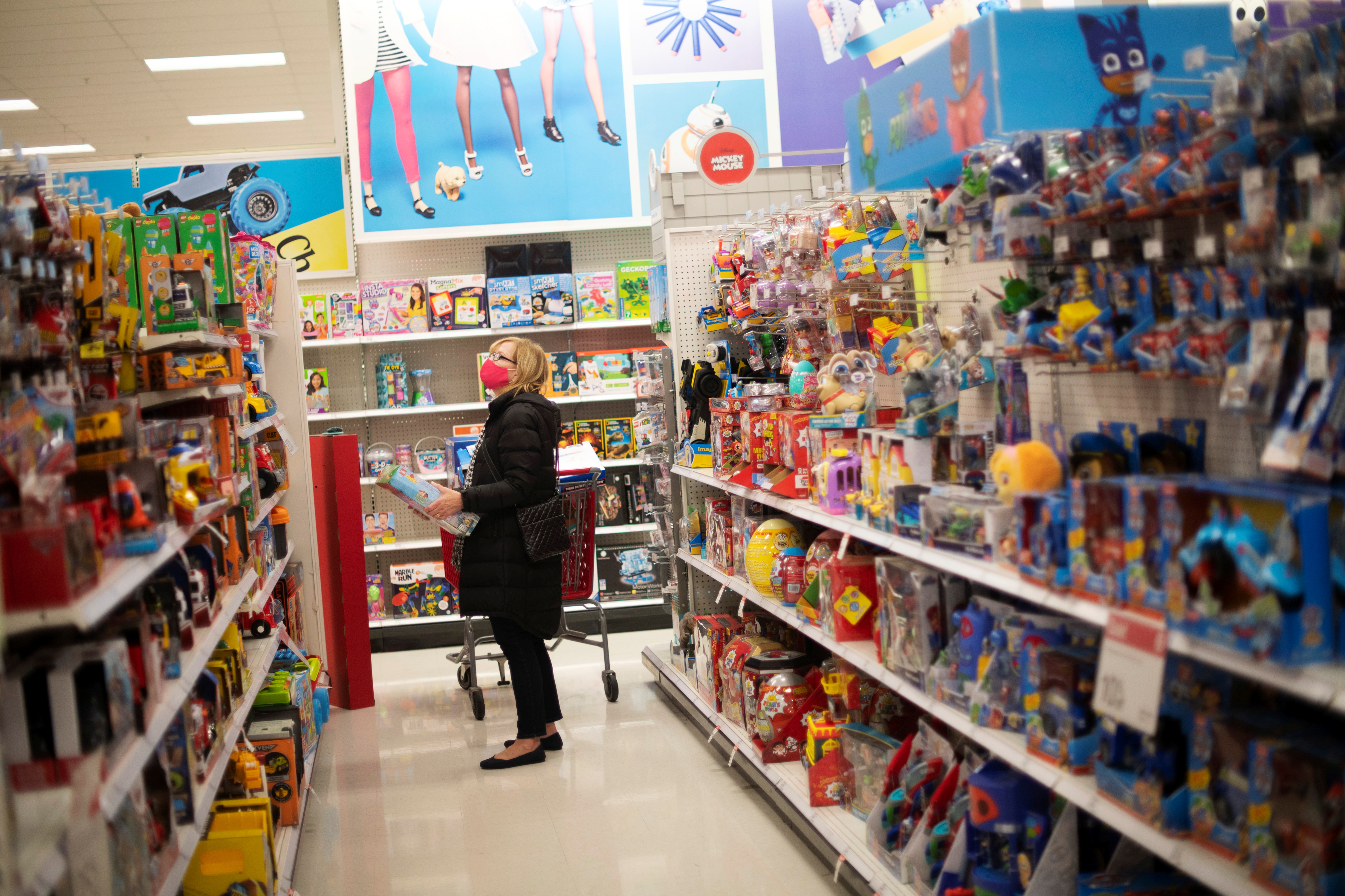 A shopper wearing a face mask due to the coronavirus disease (COVID-19) pandemic browses toys at a Target store in King of Prussia