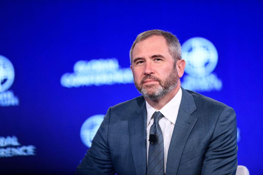 Brad Garlinghouse speaks on stage at a conference in Beverly Hills.