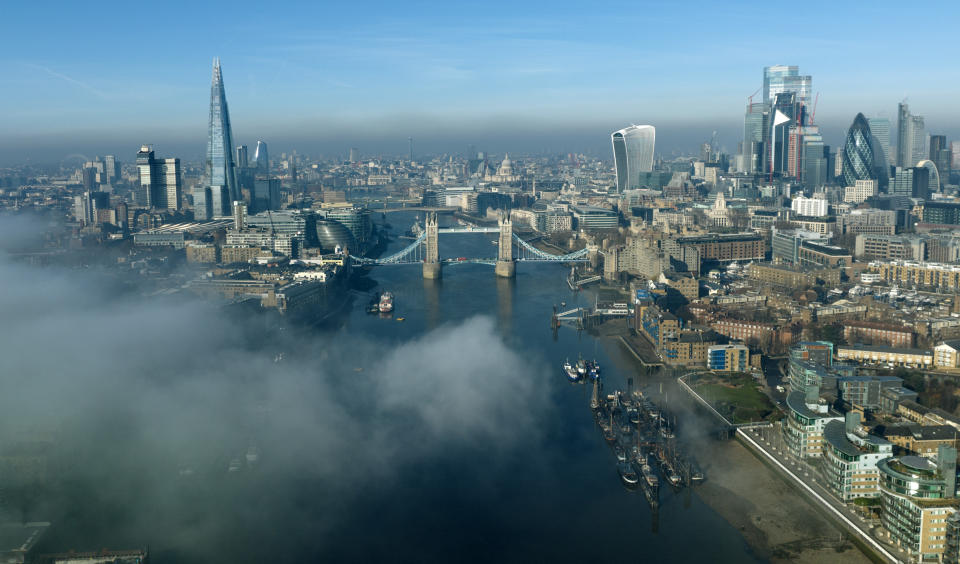 LONDON, ENGLAND - FEBRUARY 08:  Morning mist in the City Of London with the The Shard to The Gherkin and Tower Bridge in view on February 08, 2022 in London England.  (Photograph by Chris Gorman/Getty Images)