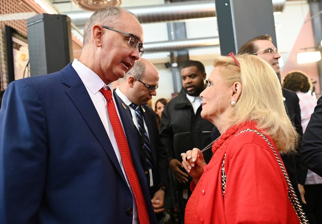 UAW President Shawn Fain, left, and Congresswoman Debbie Dingell chat after Gov. Gretchen Whitmer's fall legislative agenda special speech at the Lansing Shuffle. Wednesday, Aug. 30, 2023, in Lansing, Mich.
