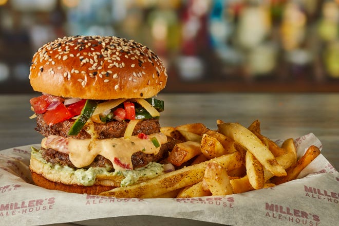 The smashed queso burger at Miller's Ale House. The restaurant is selling the burger for $13.99 in honor of National Cheeseburger Day 2023.
