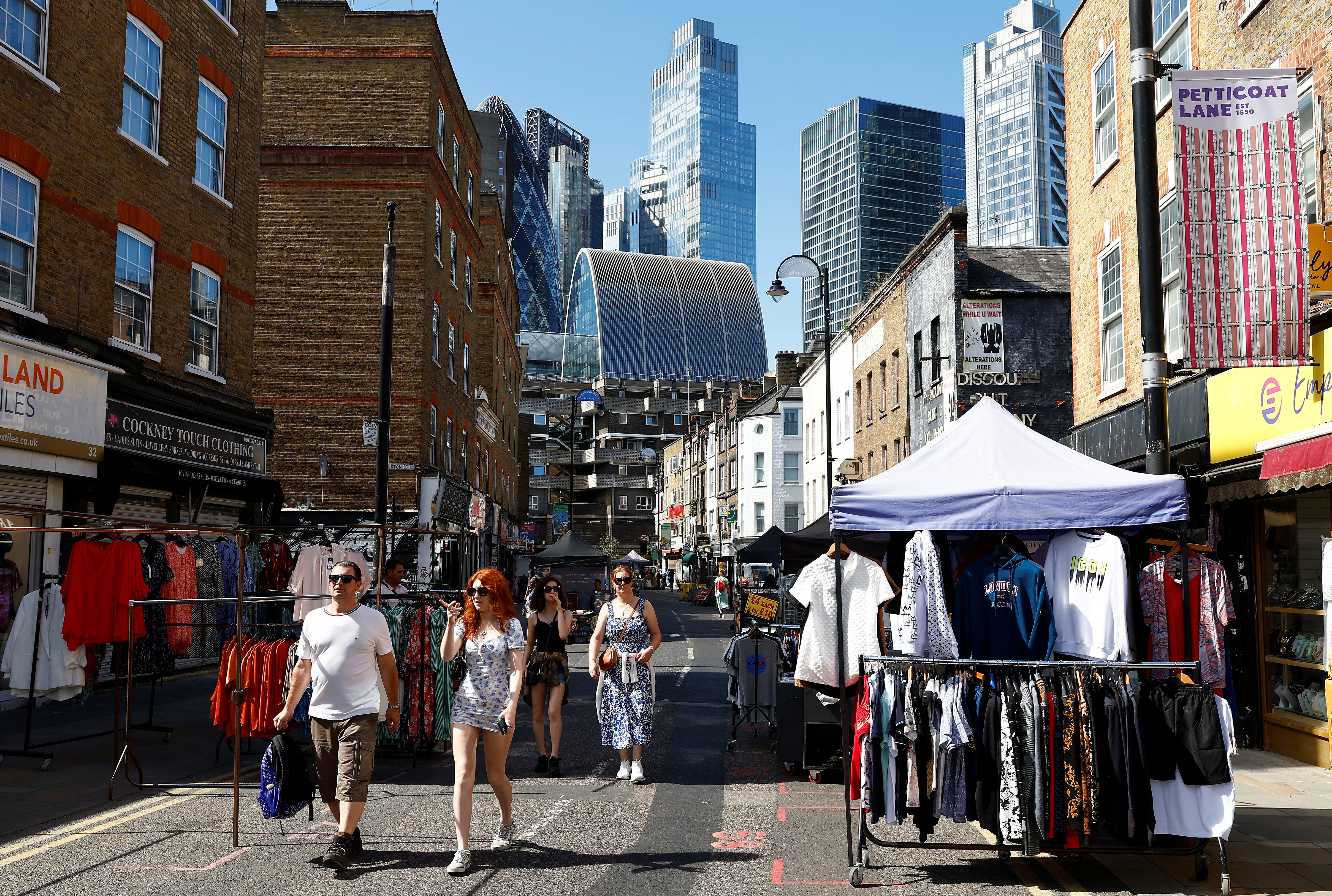 A view of City of London financial district behind Petticoat Lane street market