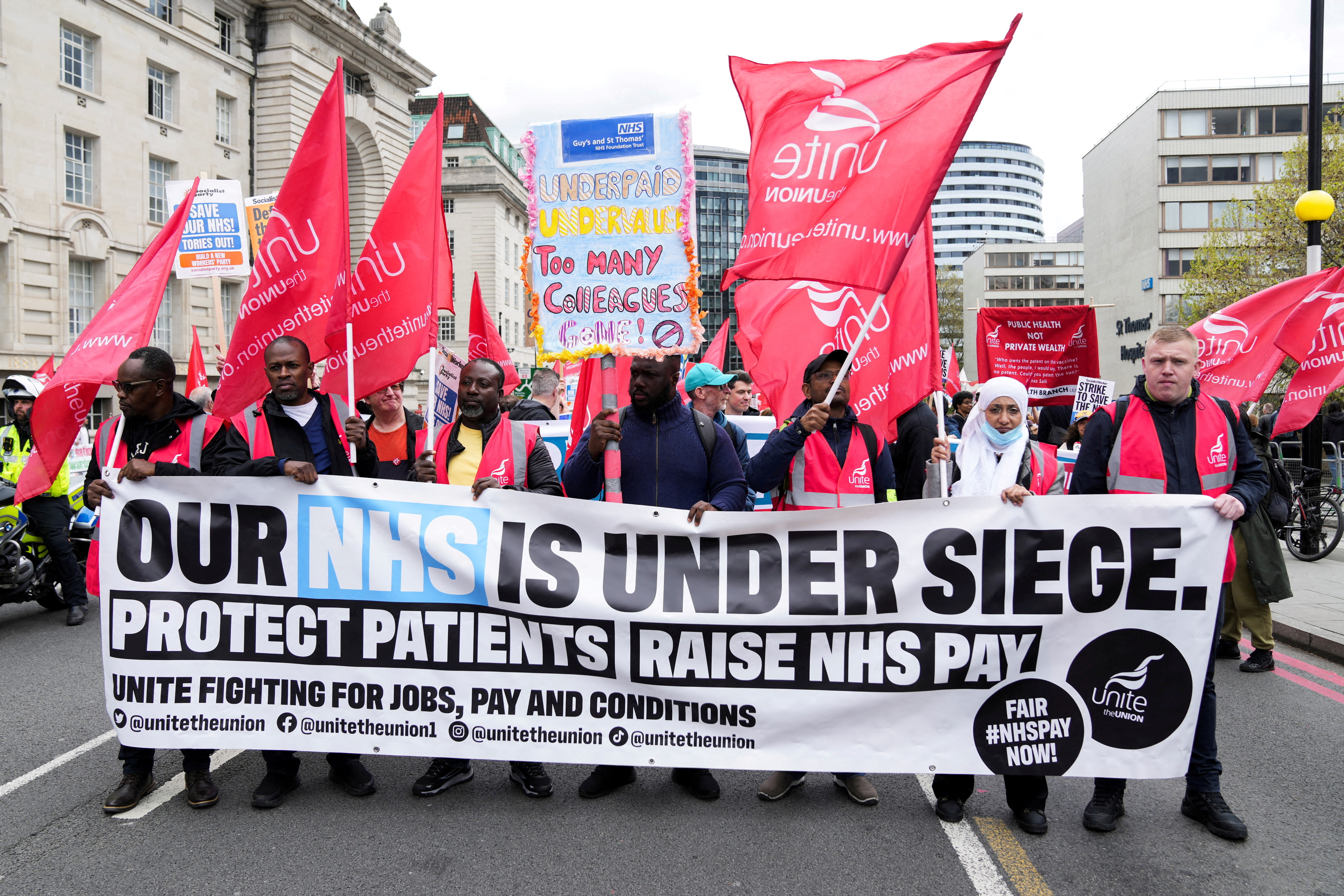 Striking NHS healthcare staff protest in London