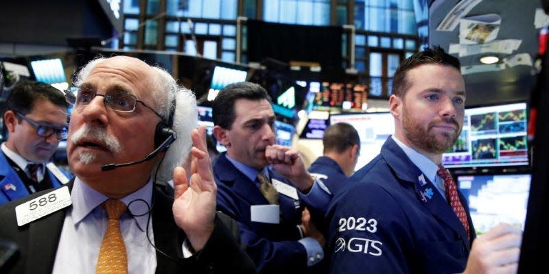 Traders work on the floor of the New York Stock Exchange (NYSE) in New York City, NY, U.S. November 18, 2016. REUTERS/Brendan McDermid