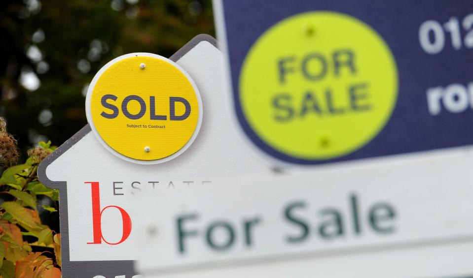 File photo dated 14/10/14 of a sold and for sale signs. The number of home sales taking place across the UK this year is on track to be around a fifth (21%) lower than in 2022, according to a property website.