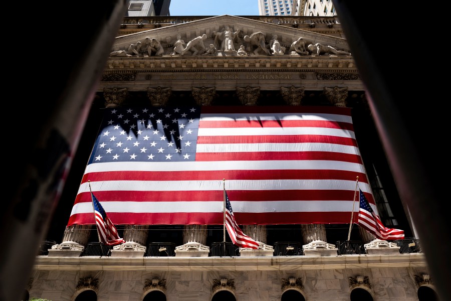 The American flag is shown at the New York Stock Exchange on Wednesday, June 29, 2022 in New York. Stocks shifted between gains and losses on Wall Street Wednesday, keeping the market on track for its fourth monthly loss this year. (AP Photo/Julia Nikhinson)